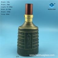 Spray painted glass wine bottle